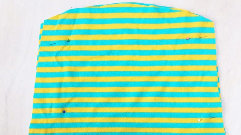 Stripey t-shirt fabric pinned for inside of do it yourself bunny costume.